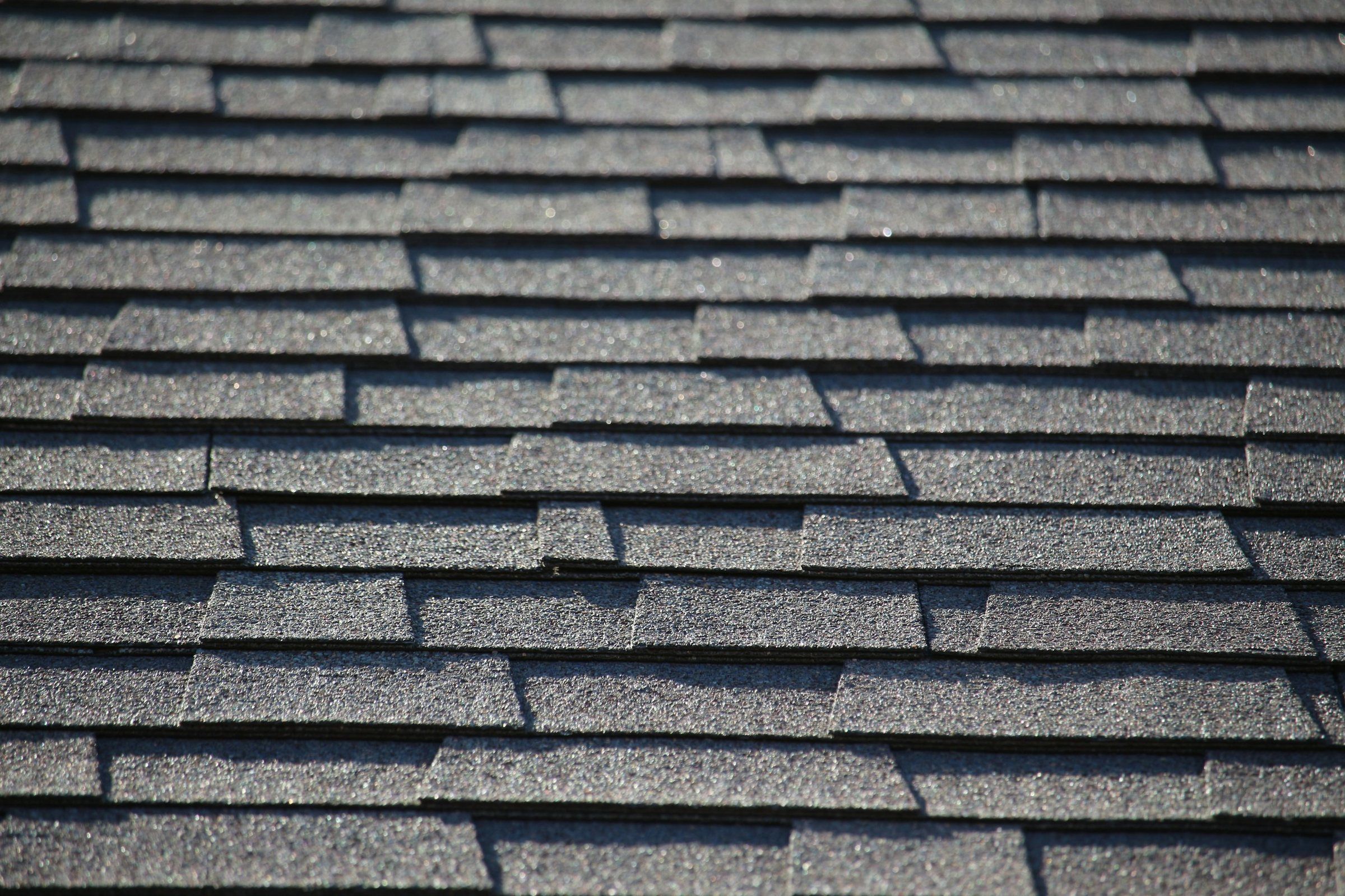 Close-up of gray three-tab asphalt shingles